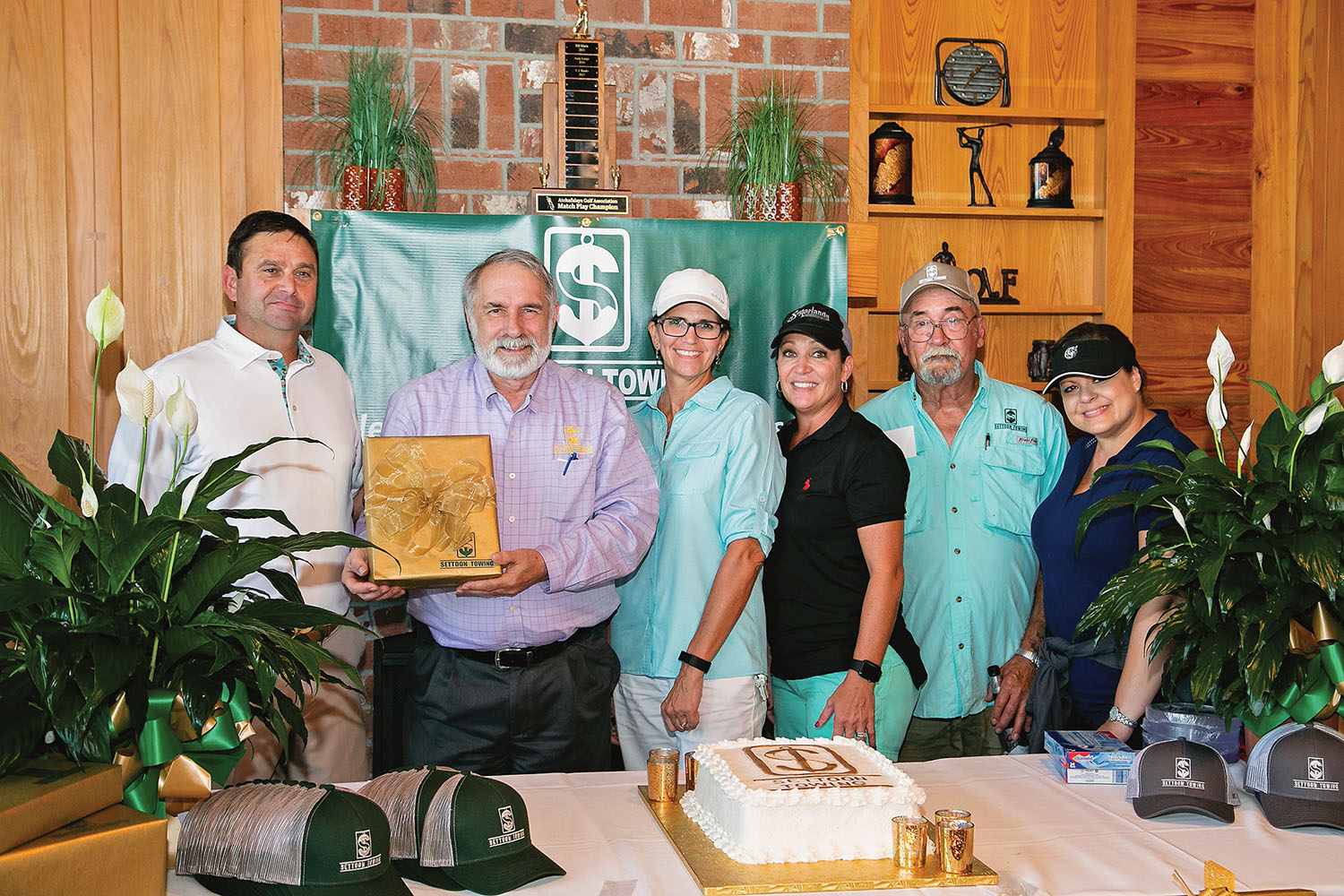 Settoon employees presented CEO Russ Settoon with a Visionary Leader Crystal Award. From left are, Russ Settoon, Rodney Estay, Stephanie Aucoin, Mandy Rousseau, John Boudreaux and Tana Indovina. (Photo courtesy of Settoon Towing)