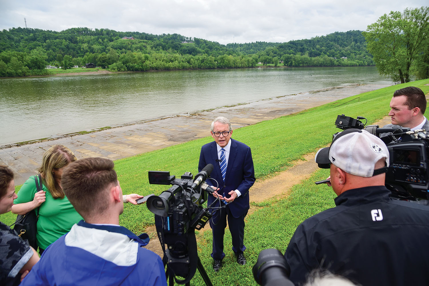 Ohio Gov. Mike DeWine speaks to local media on May 6 after announcing a $152 million plan for riverfront developments and downtown revitalization as part of Ohio’s Wonderful Waterfronts Initiative. He announced the program at the former Ohio River Lock and Dam 27 at Mile 301.0. (Photo by Jim Ross)