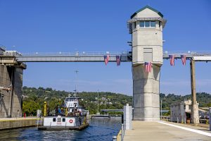 The first celebratory towboat locks through the new navigation chamber after a ribbon-cutting ceremony at the John P. Murtha Locks and Dam on the Monongahela River in Monessen, Pennsylvania, Aug. 28, 2024. (Photo by Michel Sauret/Pittsburgh Engineer District)