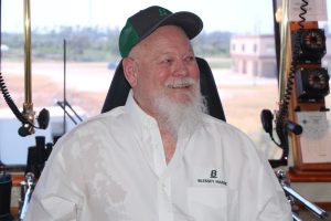 Capt. Phillip Langley in the wheelhouse of his namesake vessel. (Photo by Nelson Spencer Jr. and Frank McCormack)