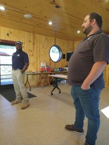 Safety training mate Marquis Epps (left) and manager Mike Bybee answer student questions after discussing career opportunities at ADM and ARTCO.