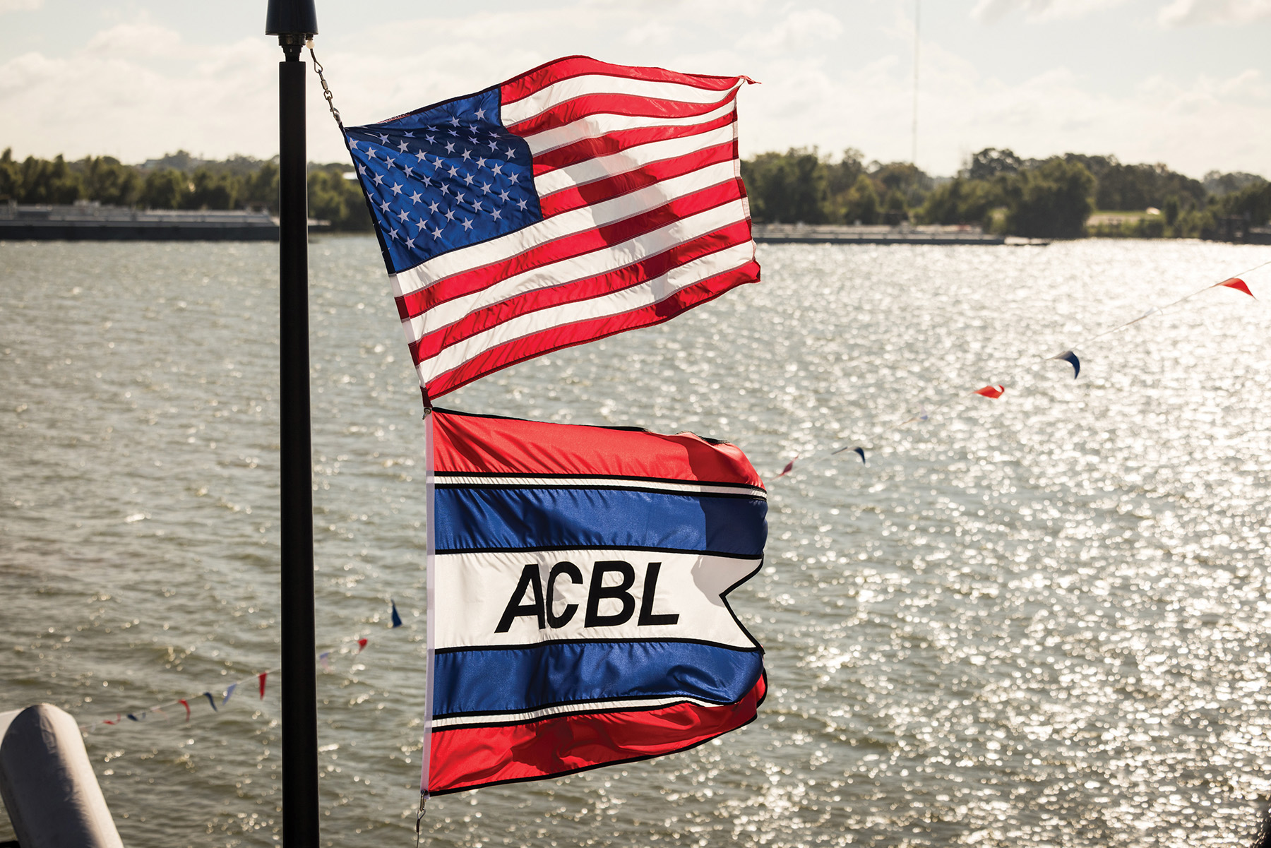 The flags of the United States and ACBL (Photo courtesy of ACBL)